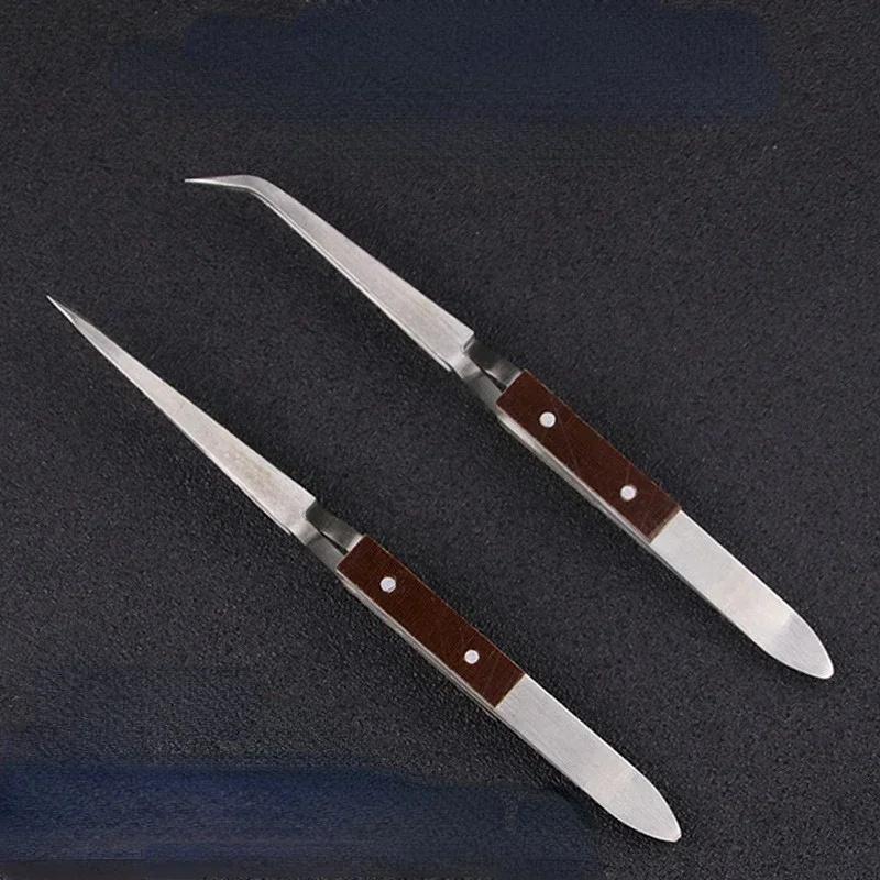 2-teiliges Set Edelstahl-Kreuz – Body Jewelry Tool Bewertung und Preis